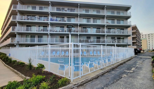 Sandy Jack's on 80th, 1 bedroom. Steps to the beach and pool! Stocked!