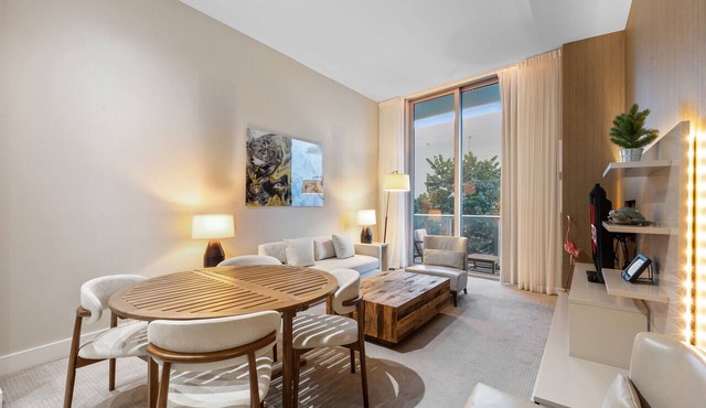 Sandy Shores: A Stylish Oceanfront Apartment - 25 min to MAJOR INTERNATIONAL SPORTING EVENT!