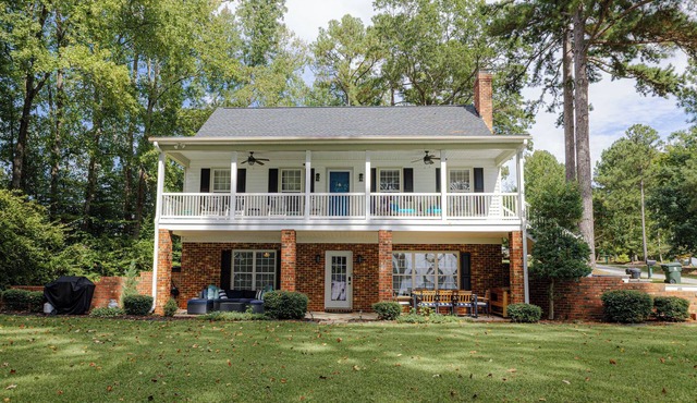 Serene Lakefront Escape with Sunset Views, Private Boathouse, and Endless Fun!