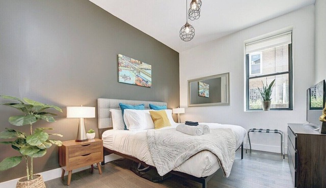 Spacious & trendy 2 bedroom 1.5 bathroom ground floor apartment as a part of a 2 unit townhouse