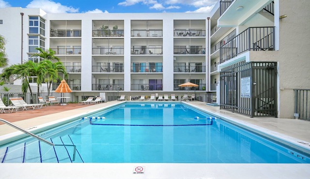 Top-Floor Near Beach Condo, Pool + Skyline Views