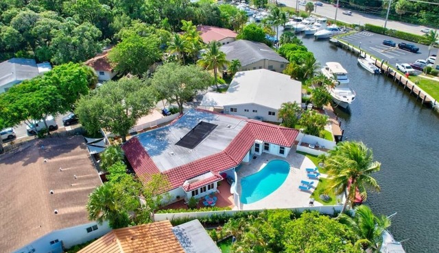 Waterfront Haven! 4BR/2.5BA + Solar Heated Pool