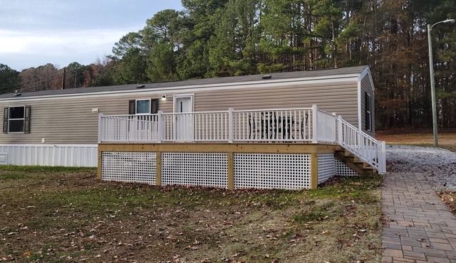 Waterfront mobile home on beautiful Lake Gaston with private pier access.