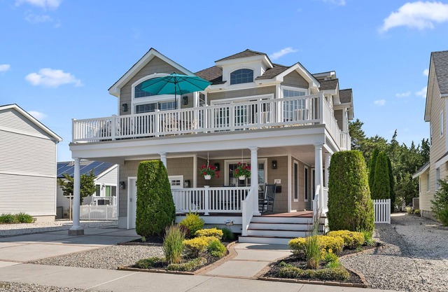 5 bedroom, 4 bath home is just nine houses from the entrance to a dune-protected beach