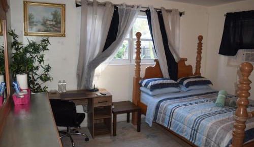 Queen Room with Shared Bathroom