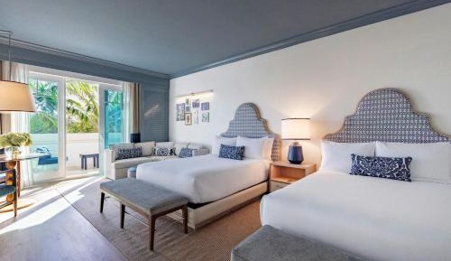 Deluxe Queen Room with Two Queen Beds and Balcony - City View