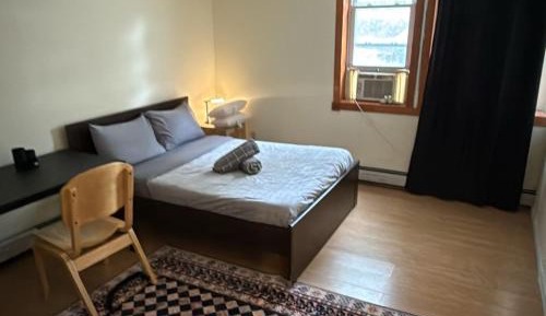 Queen Room with Shared Bathroom
