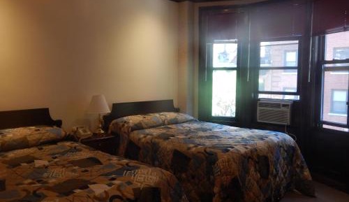 Double Room with Two Double Beds and Private Bathroom