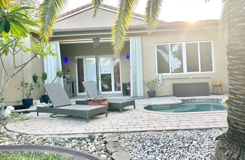 Miramar House | Beautiful lakefront retreat with outdoor kitchen, tiki hut and spa.