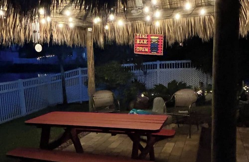 Miramar House | Beautiful lakefront retreat with outdoor kitchen, tiki hut and spa.