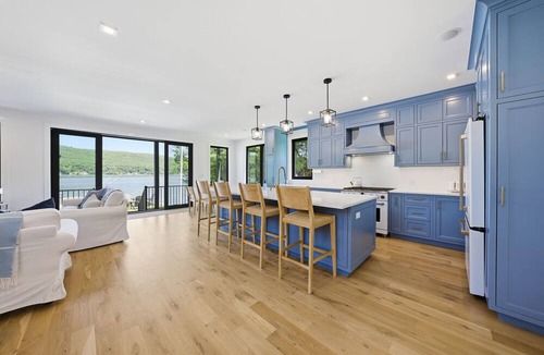 Hewitt House | Designer Lakefront | Kayaks Dock Firepit