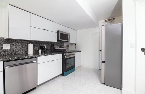 Coral Ridge Isles Apartment | Blue Oasis · Pool · Beach · Las Olas · Hard Rock Stadium · MAJOR INTERNATIONAL SPORTING EVENT 2026 · Sleeps 7