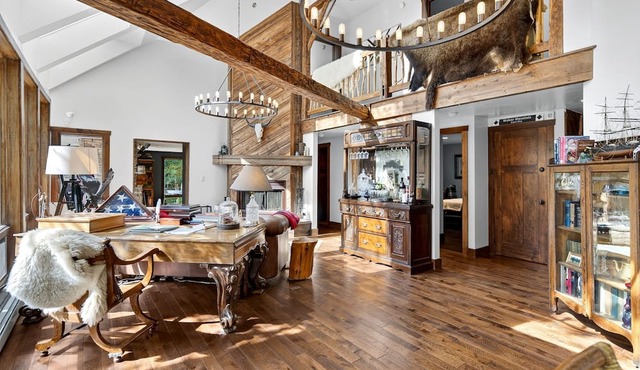 Escape to our secluded designer lodge with outdoor hot tub and fireplace