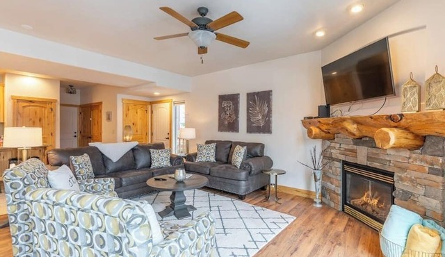 Updated condo with peek-a-boo lake views, deck, W/D, fireplace, & lake access